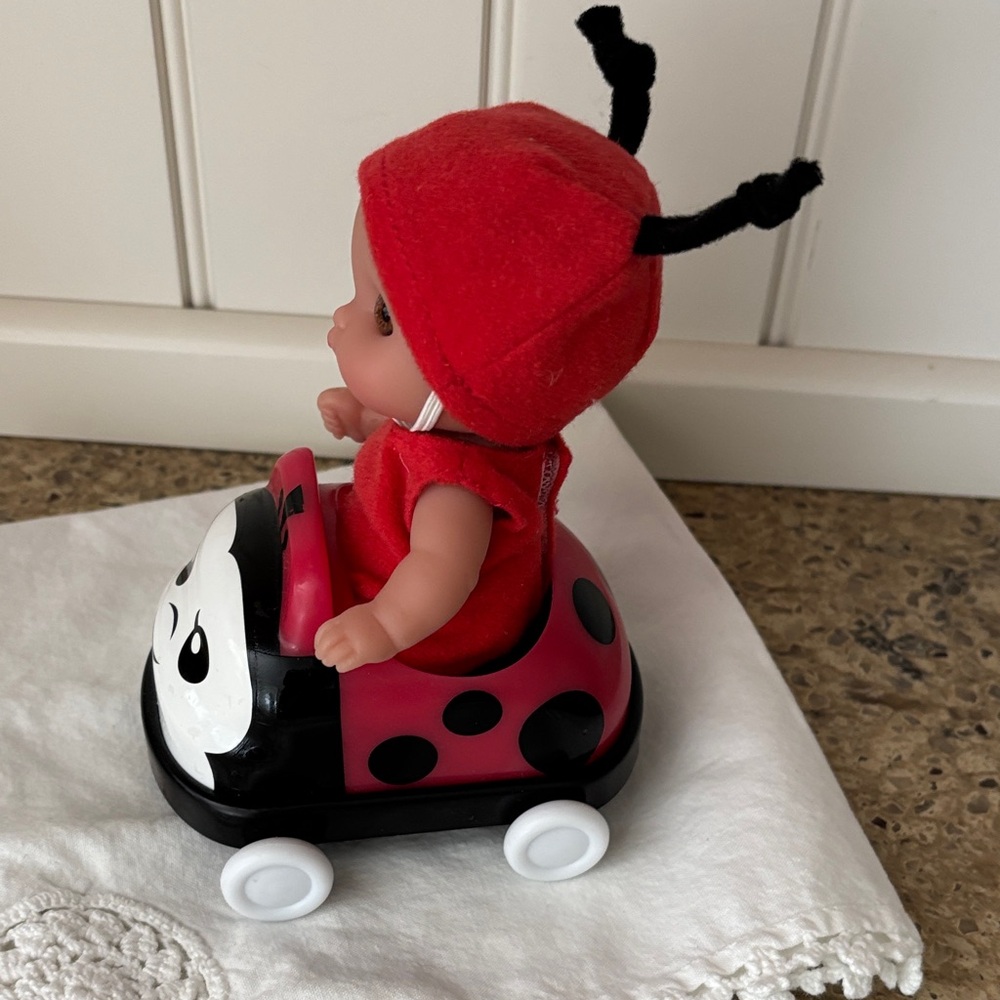 Lil’ Cutesies Red Ladybug Doll with Ride-On Buggie Car - Picture 2 of 12